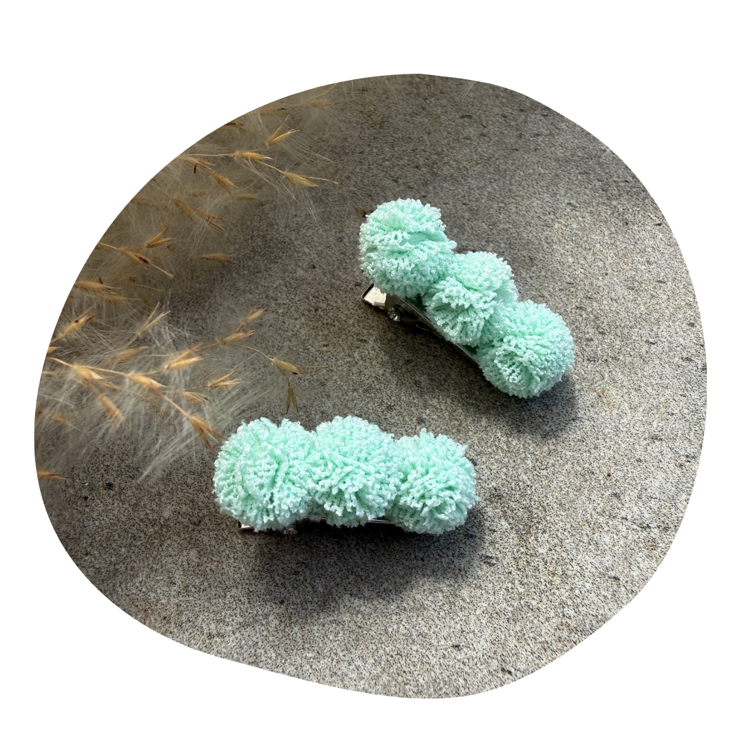 Pompom mintgroen (2 stuks)