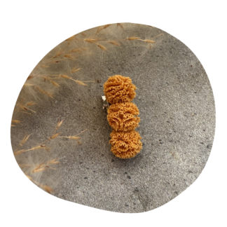 Pompom baby okergeel (2 stuks)