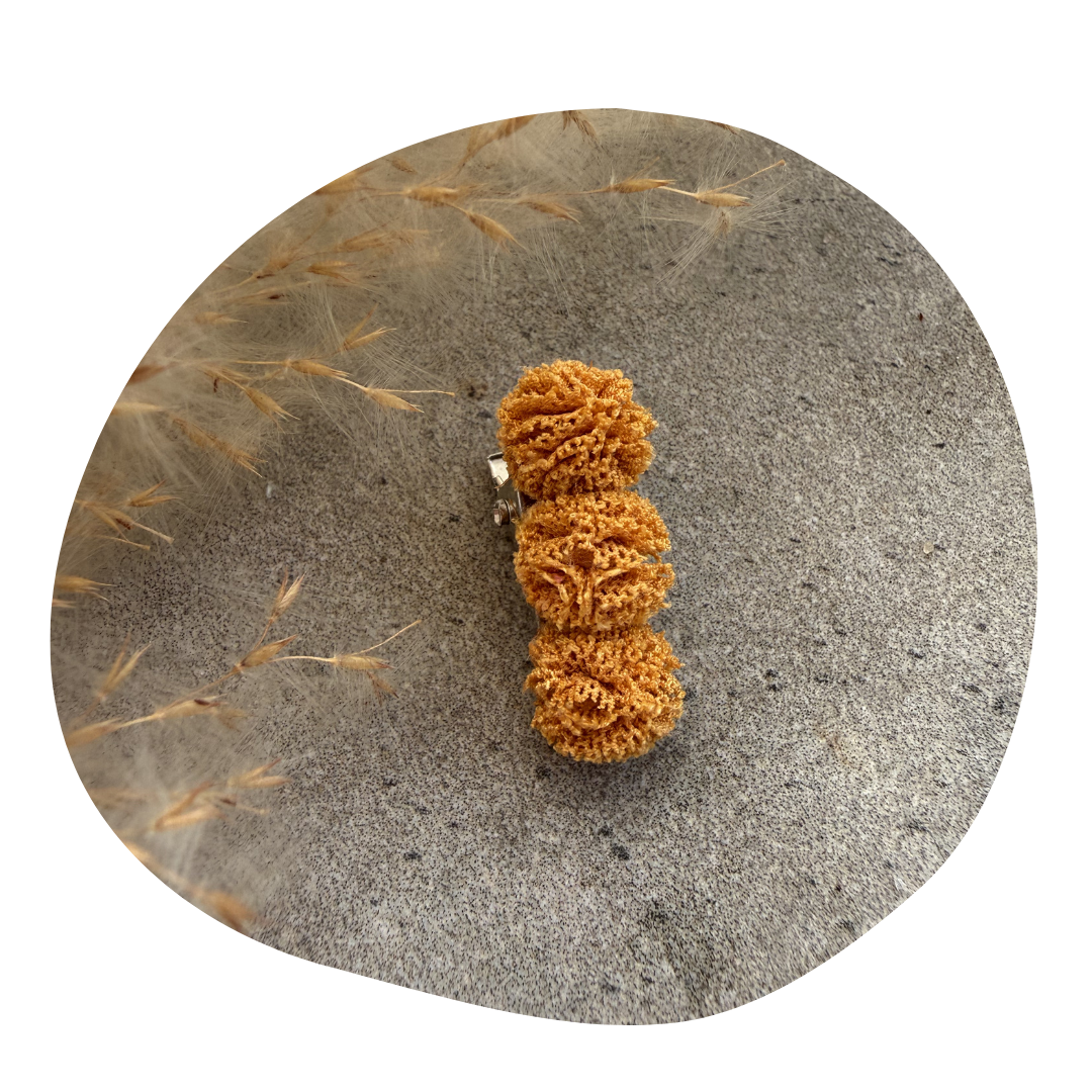 Pompom baby okergeel (2 stuks)